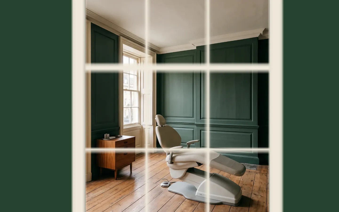 Looking through the window glass into a treatment room