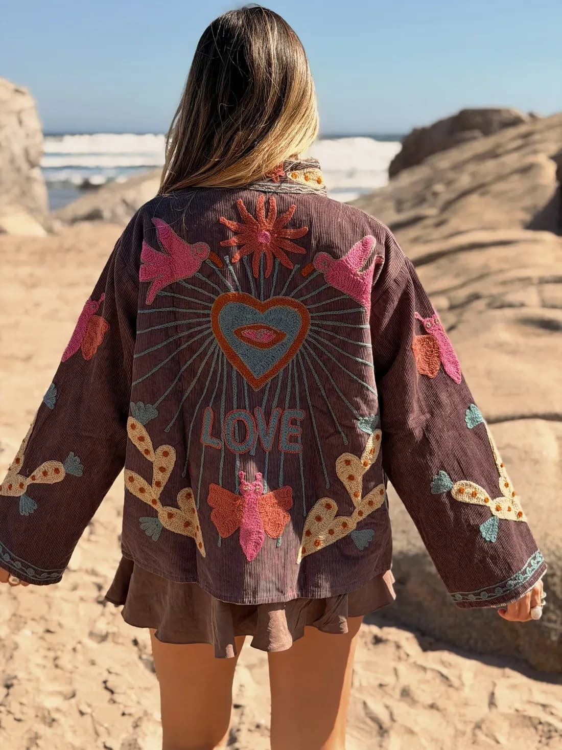 Diosa Soul: an embroidered jacket worn on the beach